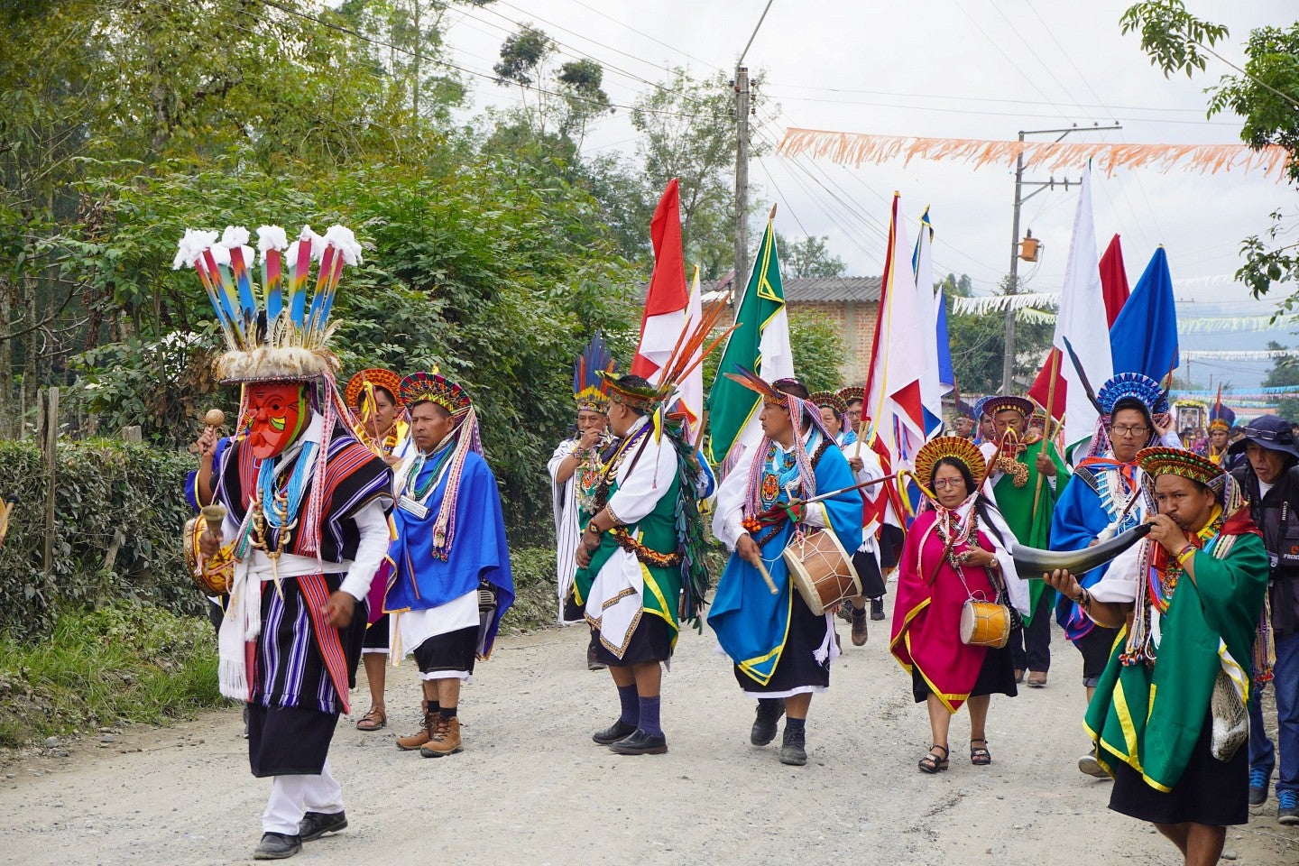 Marchers in the annual festival of Bëtsknaté are led by the Matachín, in mask, apparently representative of the sun god that was once the supreme being of Kamëntšá cosmology