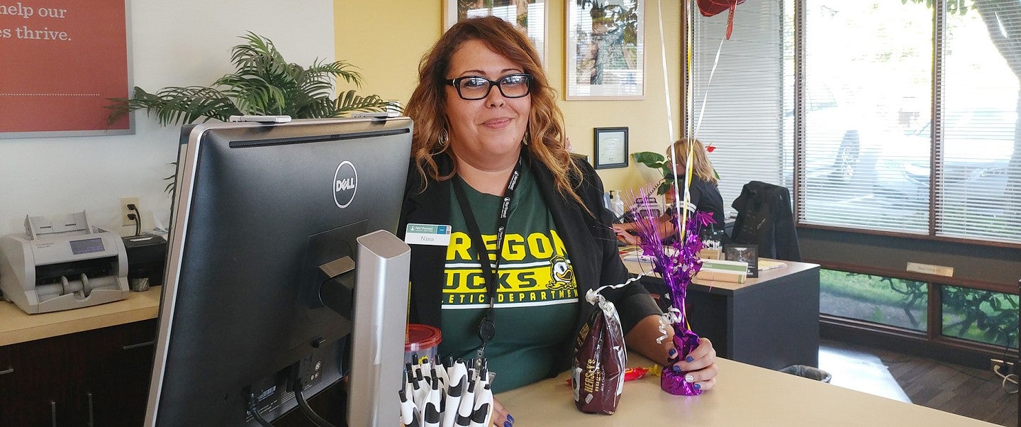 Nina Kerkebane on her last day at work as a loan officer for Northwest Community Credit Union