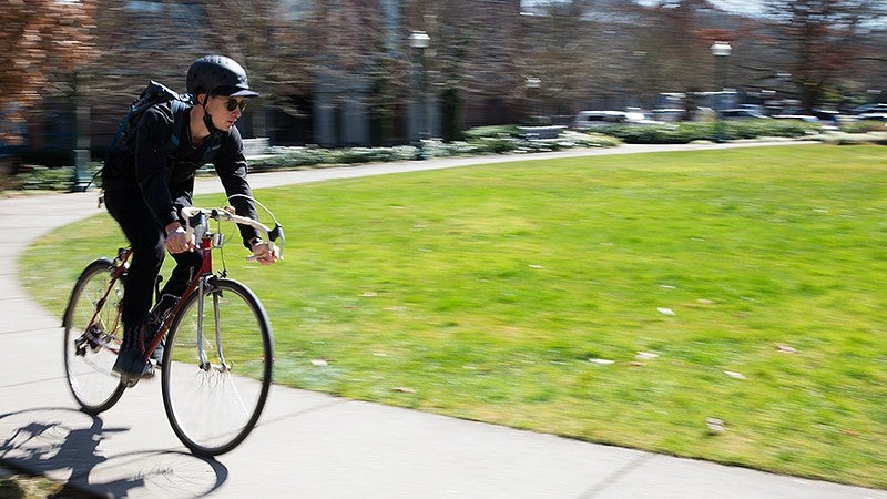 Willem Griffiths riding bicycle