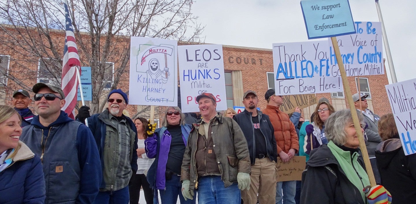 Protestors gathered outside the county courthouse to protest the occupation of the Malheur Wildlife Refuge by a far-right militia.