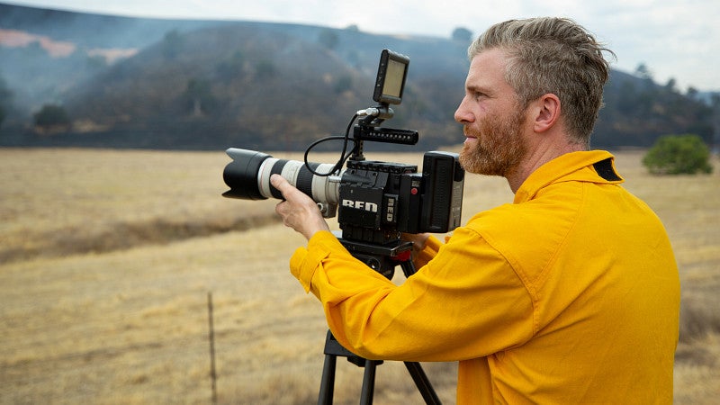 Filmmaker Trip Jennings behind camera