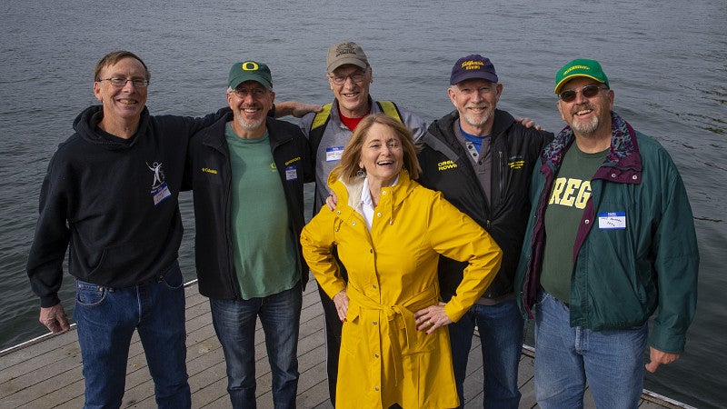 Vicky Brown and fellow alum rowers from UO at lake