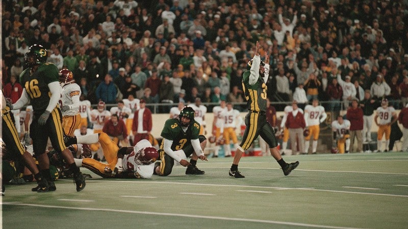 Ducks placekicker Josh Frankel raises his arms in victory after his game-winning field goal