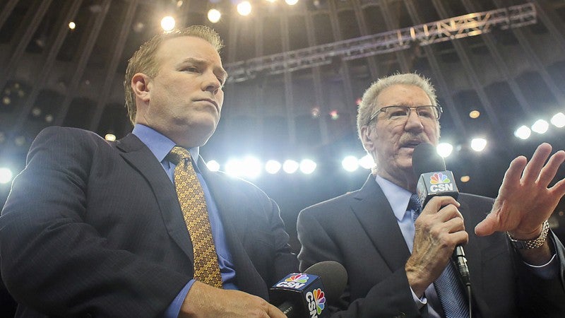 Jim Barnett with another announcer at basketball game