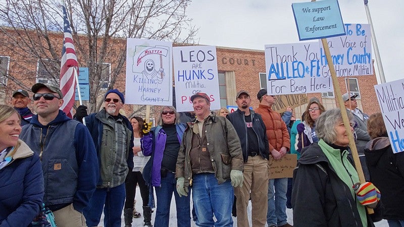 Protestors gathered outside the county courthouse to protest the occupation of the Malheur Wildlife Refuge by a far-right militia.