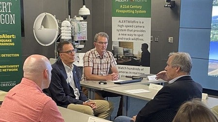 President Scholz at a meeting about the Oregon Hazards Lab