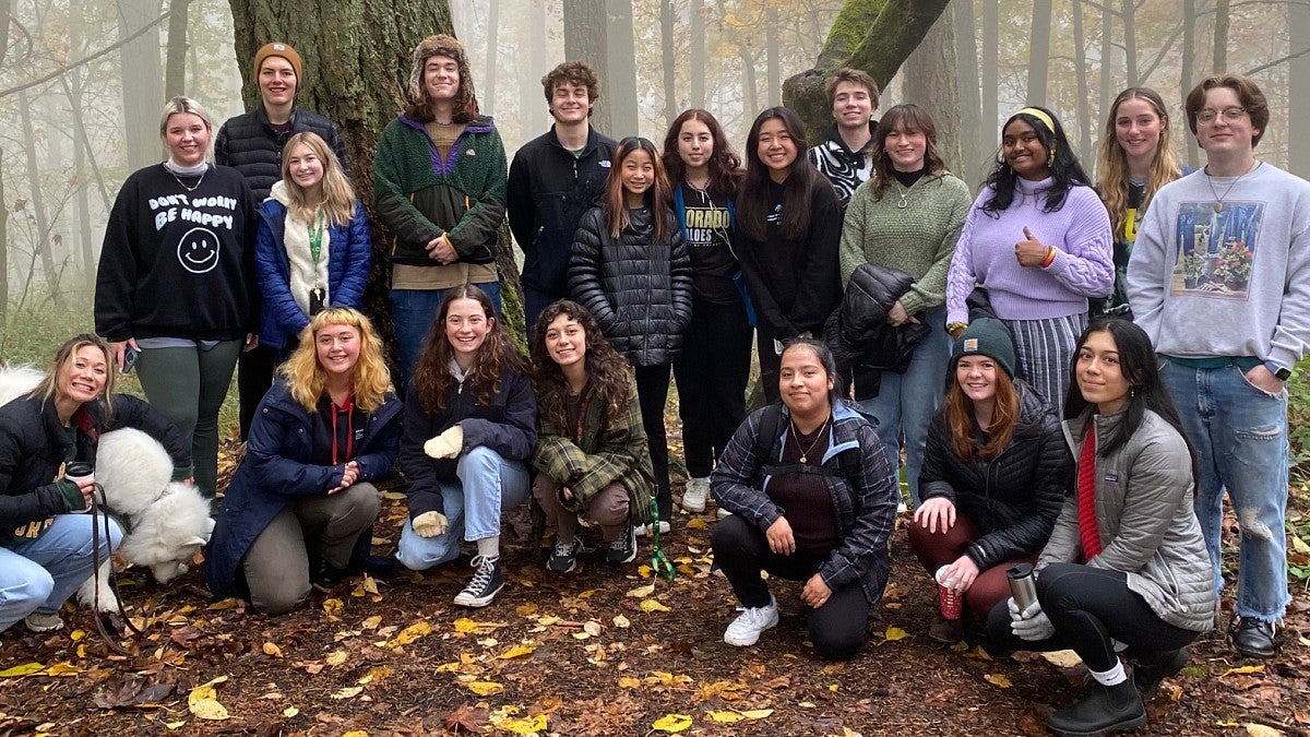 happiness class students in the woods