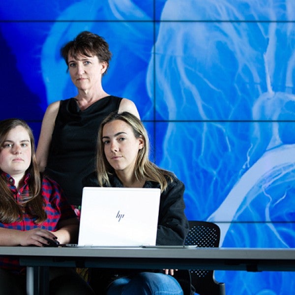 Professor Amy Lobben with geography alumna Josie Imrie and geography major Arielle Alferez