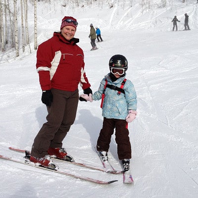 Gwen Lillis skiing with grandchildren