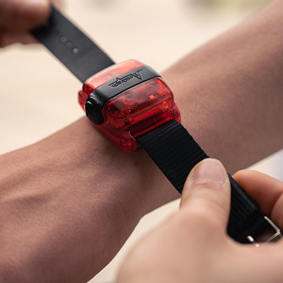 An accelerometer -- a watch-like device -- is strapped to a teen's wrist